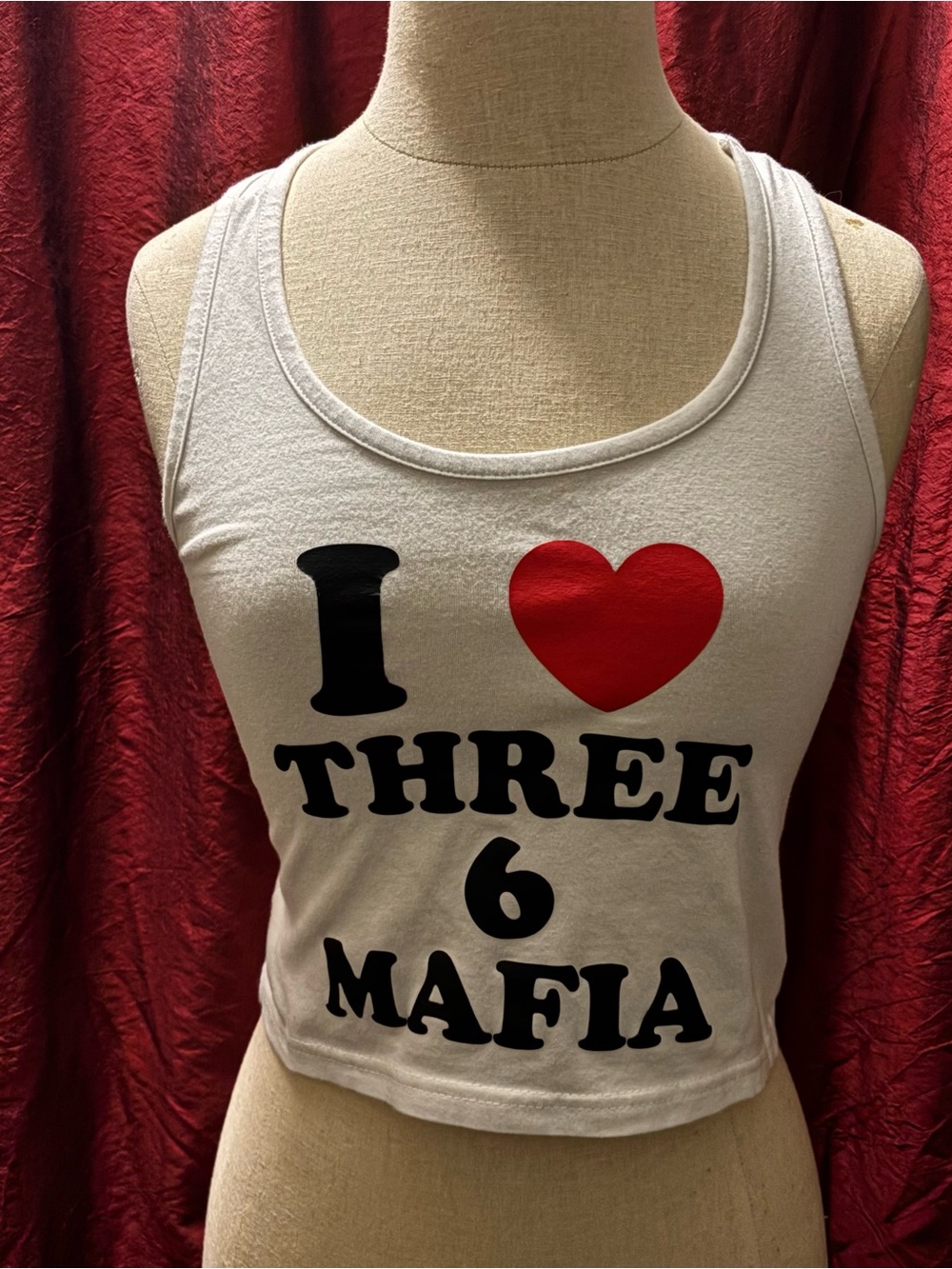 I love three 6 mafia white cropped racerback tank